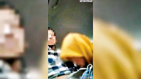 Malay wife in hijab giving blowjob to another man