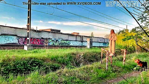 SugarNadya shows off sexy body outdoors near train tracks