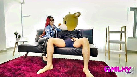 Rosario with red hair poses intimately with masked Milky Bear in underwear
