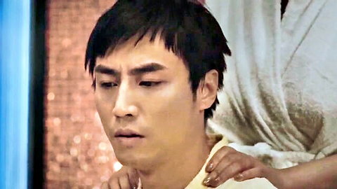 Asian man in shirt gets shoulder massage from woman in white robe, R-Gama scene