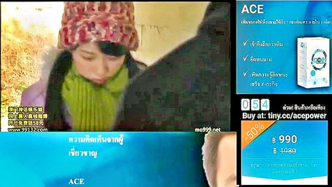 Distressed Asian wife in hat and scarf with man in emotional affair discovery scene