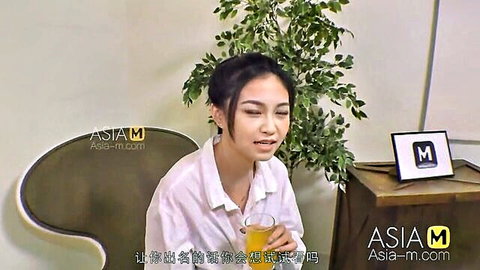 Song Nan Yi in white shirt sipping orange juice, Asian ModelMedia pickup tease