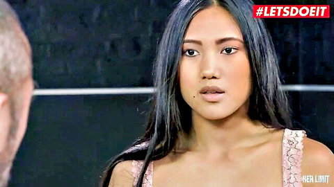 May Thai in pink lace top, intense gaze with Luca Ferrero in hardcore scene