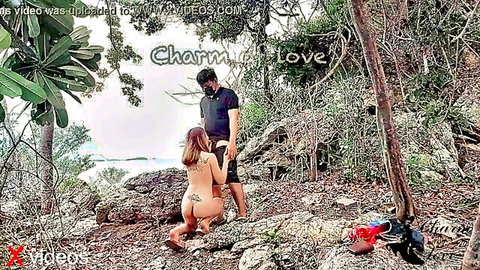 Nude brunette kneels doggy style outdoors exposing pussy as masked man stands behind gripping her ass