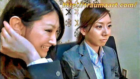 Two Asian beauties in hypnotic job interview JAV, suited and smiling