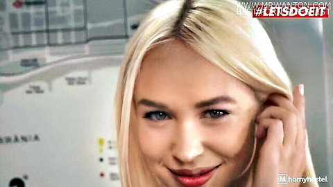 Seductive blonde babe smiling teasingly closeup in laundry room ready for rough sex