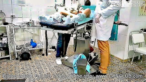 Doctor in gloves fingers exposed pussy of patient on gyno chair in hospital exam