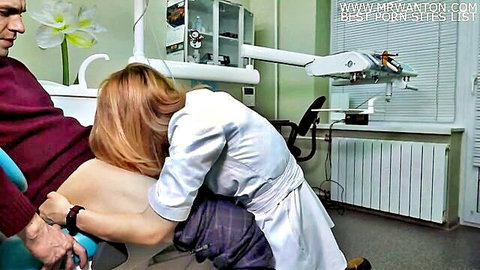 Redhead Russian doctor with glasses deepthroats big cock in dental chair roleplay