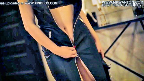 SugarNadya in seductive black leather zipper outfit teasing her toned midriff