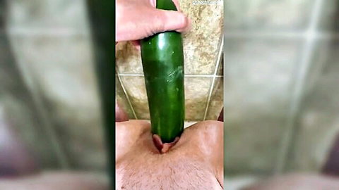 Amateur solo: Large cucumber inserted deep into hairy pussy
