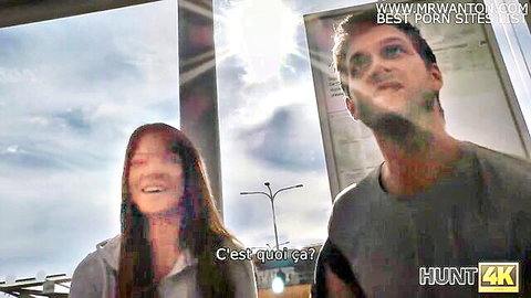Smiling redhead woman and man at bus stop, Hunt4K couple pickup preview