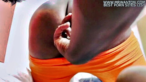 Curvy village aunty pussy fingered from behind in orange shorts