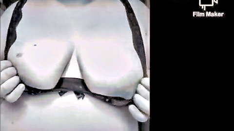 Curvy woman pulling down black bra to expose large breasts