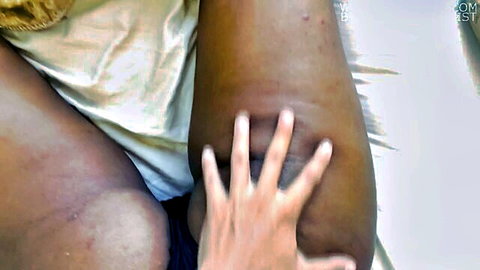 White hand roughly squeezing ebony babe's thick juicy ass cheek