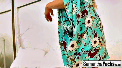 Samantha Saint in floral dress teasing with stockings fetish