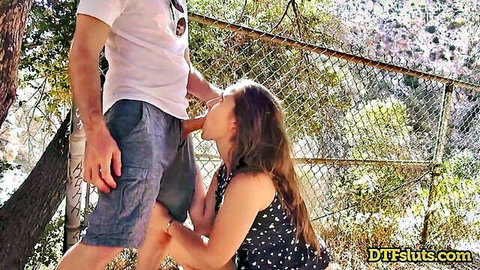 Dani Daniels outdoor public blowjob on knees in dress