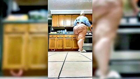 Fat white BBW with massive ass, thick thighs and wide hips bending over kitchen counter