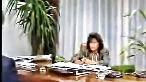 Vintage 1985 Teresa in office suit, professional look