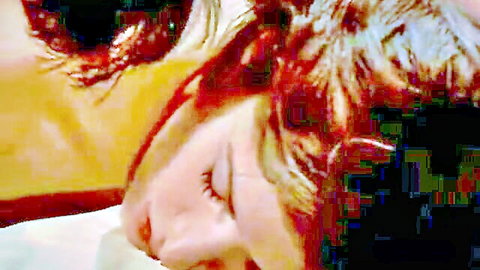Close-up of aroused blonde woman in intimate sex position