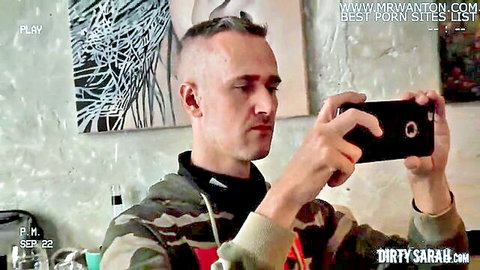 Dirty Sarah video: Man in camo takes selfie, cash in ass fetish scene