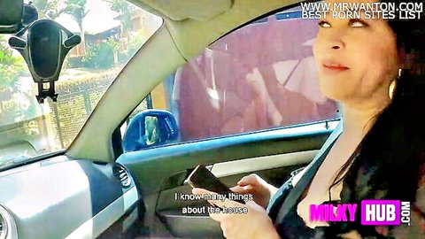 Mature Asian stepmom in car, cleavage tease, neglected and horny