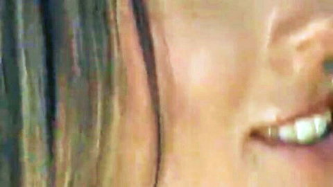 Roxy Jezel smiling close-up, blonde hair Asian beauty