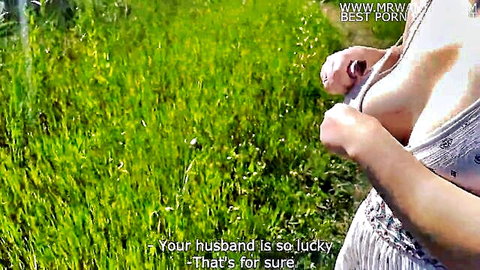 Busty wife flashing cleavage in public field, husband so lucky