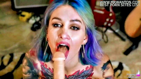 Flame Jade rock musician blowjob on big dildo with facial closeup