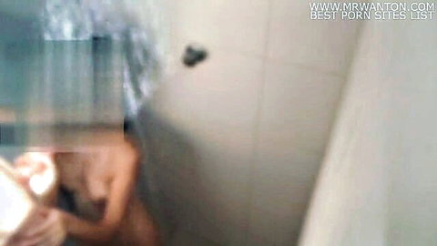 Steamy nude woman in shower, wet body tease for hot sex