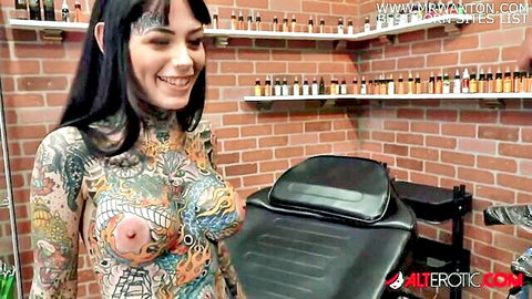 Tiger Lilly naked, tattooed alt girl getting forehead tattoo