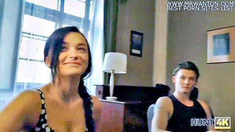 Seductive brunette in polka-dot top teases boyfriend in intimate scene