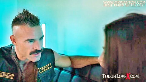 Evelin Stone faces intense biker Karl in ToughLoveX purgatory scene