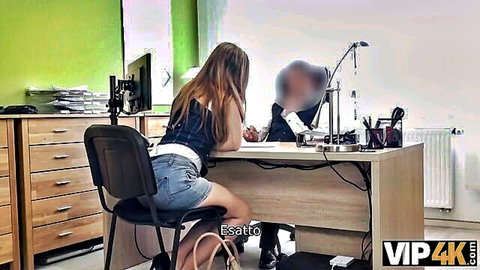 Suzie Sun redhead in short denim skirt, teasing from behind at desk