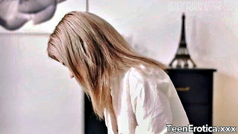 Herda Wisky, dainty blonde teen masseuse in white shirt, seductive profile