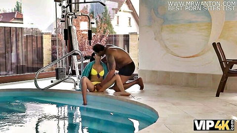 Madelina Dee in yellow bikini kissed by naked black coach poolside
