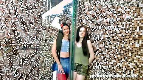 MILF and teen girl posing wet in spa shower before fuck lesson