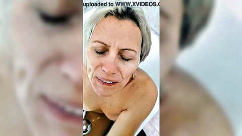 Sabina Agos topless in bath drinking husband's piss, blonde MILF watersports