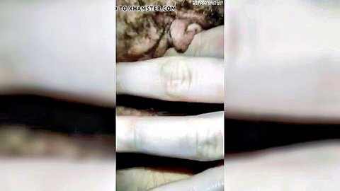 Ukrainian MILF spreads her big clit and wet pink pussy wide open with fingers in solo masturbation closeup