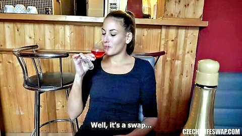 Sexy Czech wife sips red wine at bar in tight top teasing wife swap