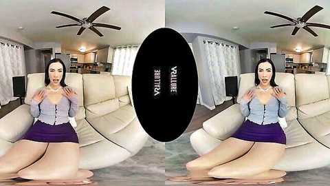 Diana Grace seductive VR pose in sweater and mini skirt, teasing on couch