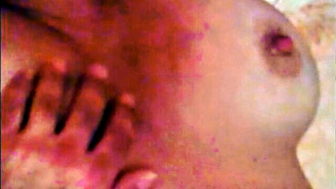 Close-up of erect Greek nipple and natural breast in adult thumbnail