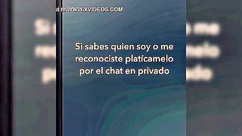 Mystery Latina woman teasing in dim light, inviting private chat on adult video