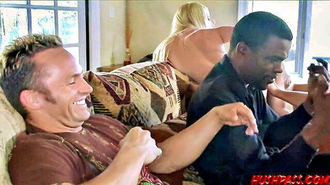 Blonde babe teases in interracial group sex with big cock men