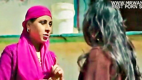 Desi hijabi babe in pink scarf intimately talks to brunette in tight outfit