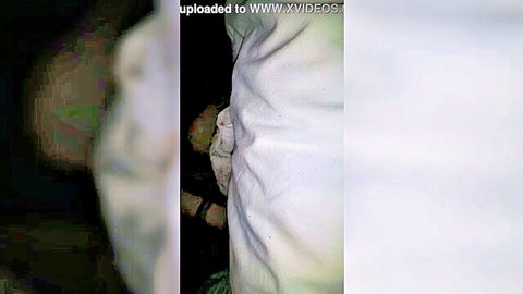Blurry close-up of white girl on sheets, loving daddy's dick