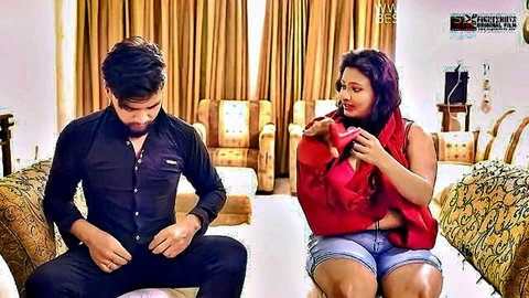 Curvy Indian woman in red top and denim shorts teases big ass with man