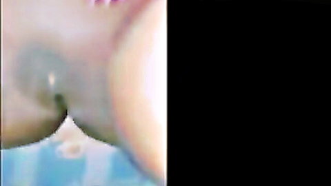 Extreme close-up of wet spread pussy lips with creamy discharge visible inside