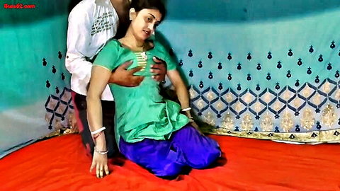Indian man squeezes kneeling woman's big tits from behind in salwar kameez homemade foreplay