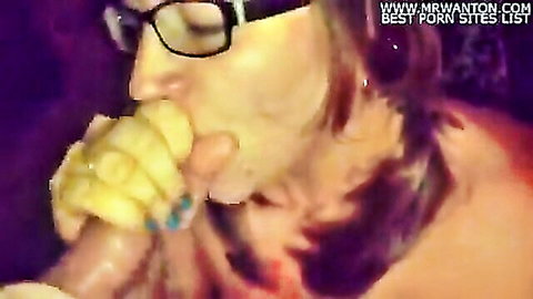 Amateur slutwife in glasses giving intense blowjob to friend