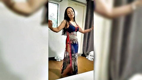 Yasmine in sheer blue dress, seductive pose, long dark hair